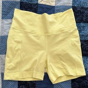 Butter yellow Athleta Girl biker shorts